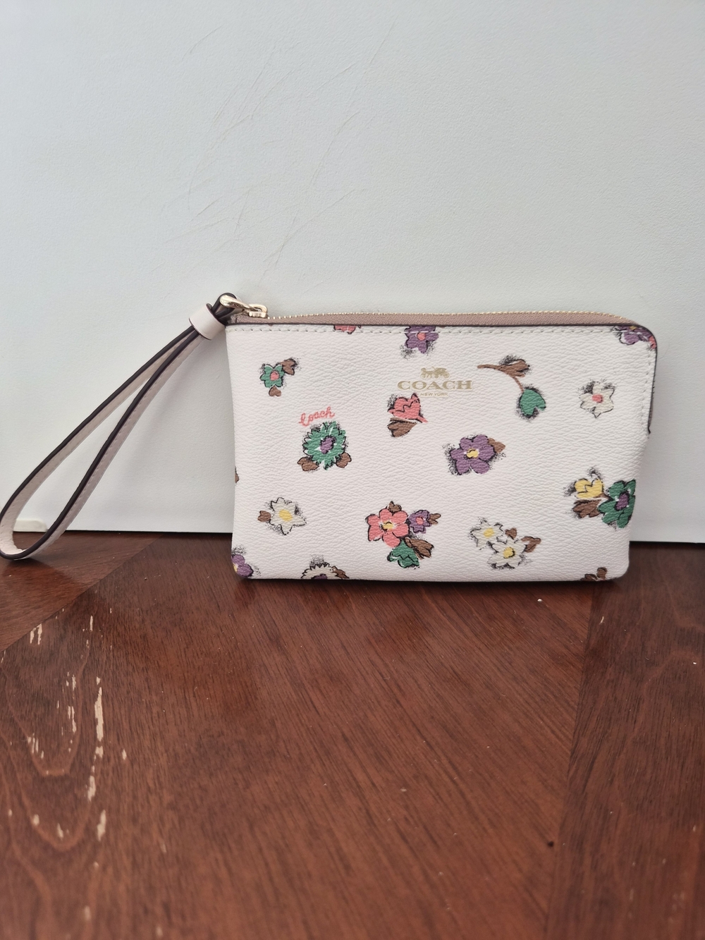 COACH Floral Wristlet in White with Multicolor Blooms
